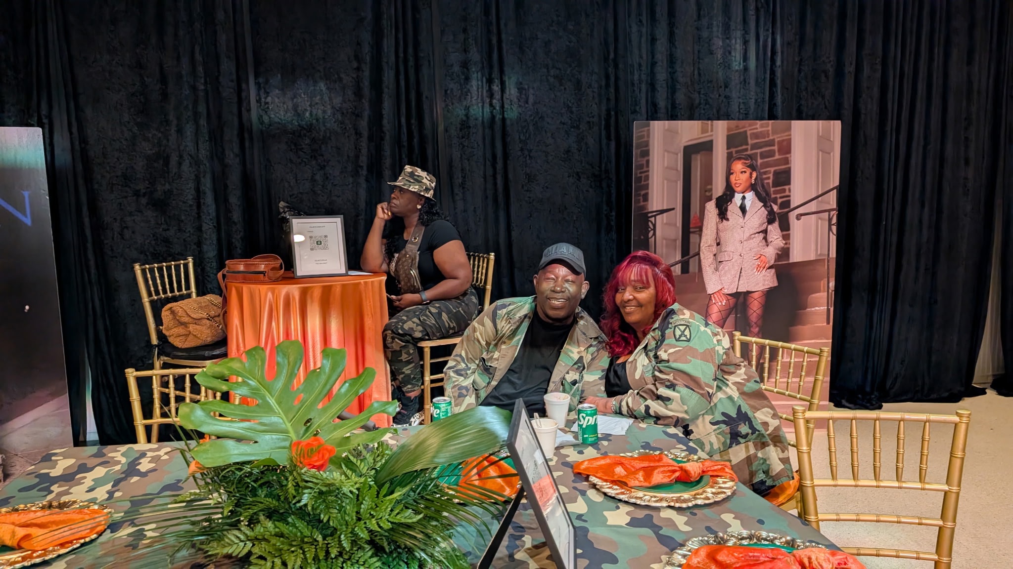 Michael seated beside a loved one at a celebration