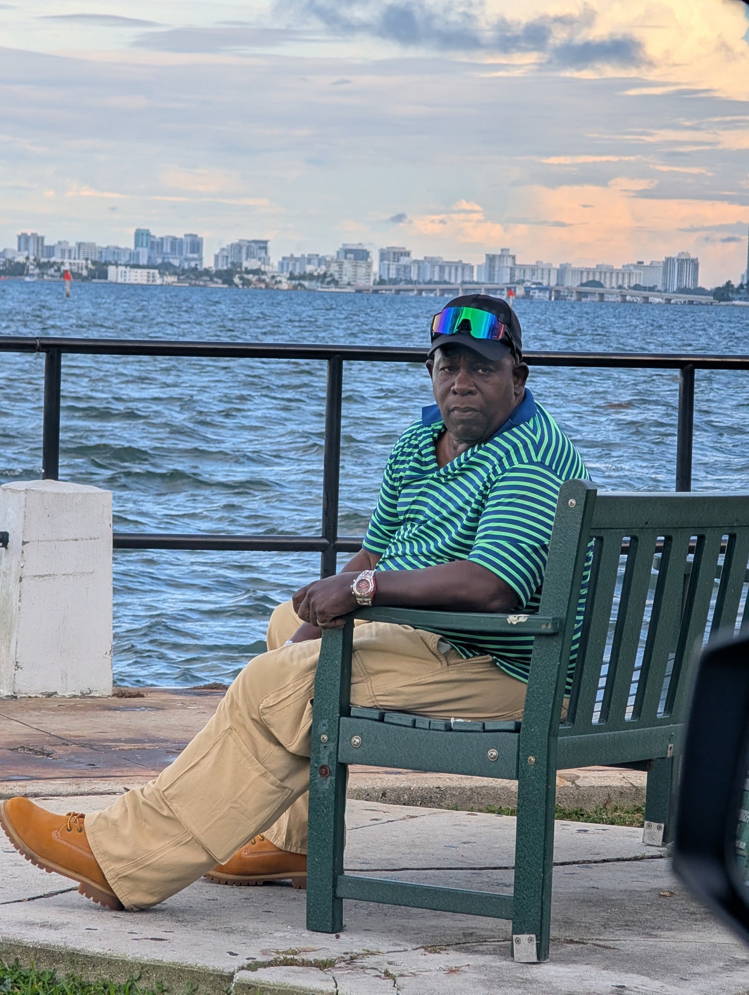 Michael relaxing beside the waterfront